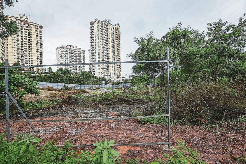 Parts of the perimeter fencing has been removed by vandals. u00e2u20acu2022 Malay Mail pic