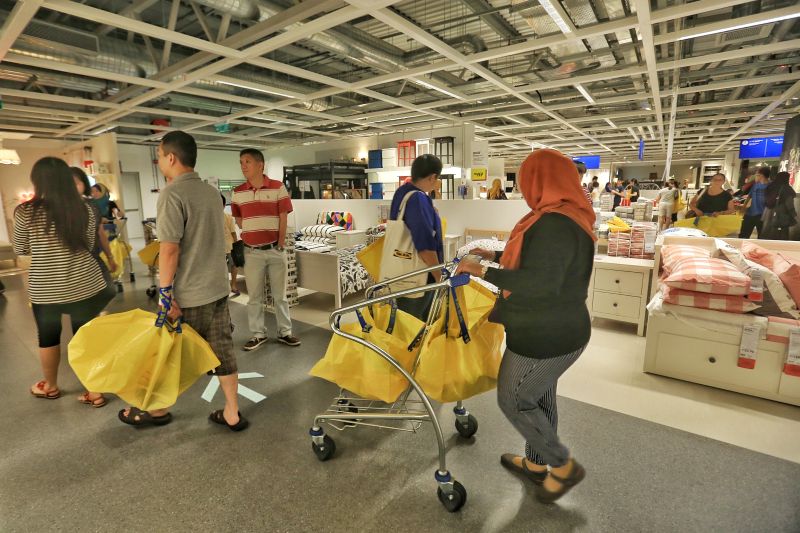 Customers take a look around the new Ikea Cheras which is 20 per cent bigger than the first branch in Damansara. ― Picture by Saw Siow Feng