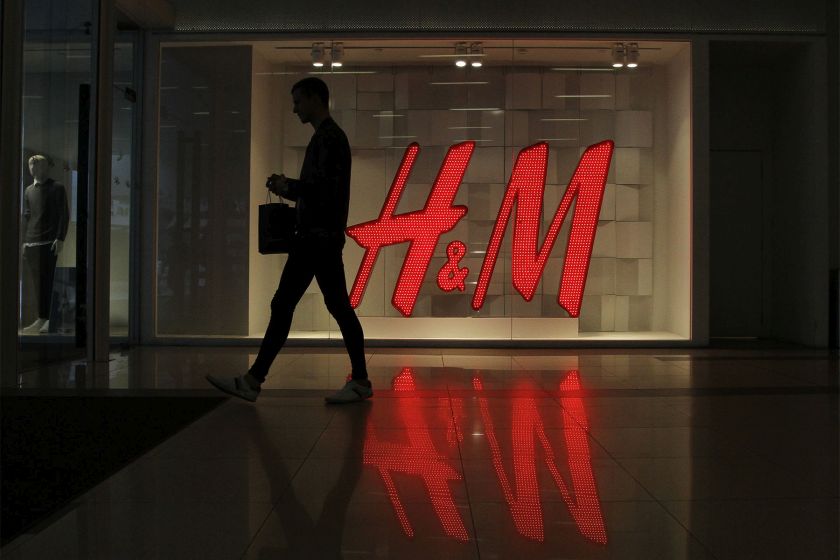 A passer-by walks past the signboard outside the H&M store at Avenue K in Kuala Lumpur, November 4, 2015. u00e2u20acu201d Picture by Yusof Mat Isa