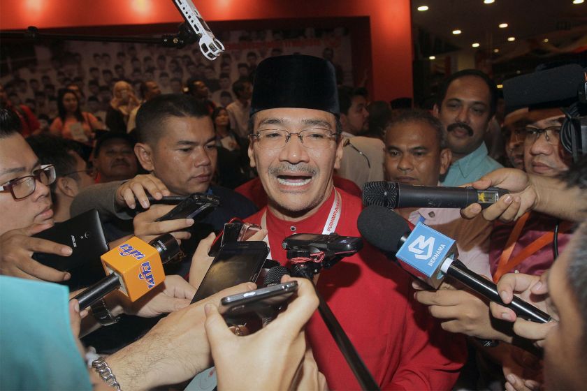 Umno Vice-President, Datuk Seri Hishammuddin Hussein speaks to reporters before making his exit from Putra World Trade Centre, December 12, 2015. u00e2u20acu201d Picture by Yusof Mat Isa