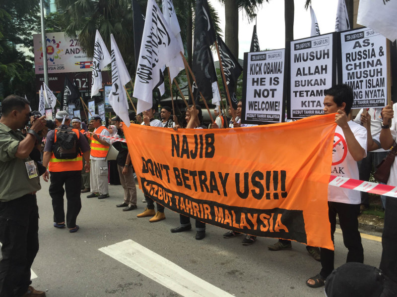 About 50 members of the Muslim NGO Hizbut Tahrir protest against US President Barack Obamau00e2u20acu2122s visit to Malaysia, on Nov 21, 2015, in front of KLCC where the Asean summit is taking place. u00e2u20acu201d Picture by Kamles Kumar