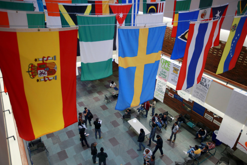 The Great Court At Kettering, a small private university with about 200 international students, where flags hang from the ceiling for each nation represented by the student body, in Flint, Mich., March 13, 2015. — Fabrizio Costantini/The New York Times pic