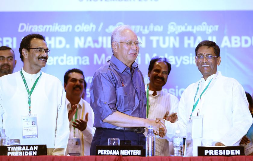Najib congratulates Dr Subramaniam on the smooth running of the MICu00e2u20acu2122s Central Working Committee(CWC) re-election yesterday. Looking on are new MIC deputy president Devamany (left) and newly-elected CWC members (background). u00e2u20acu201d Picture by Razak Ghazali