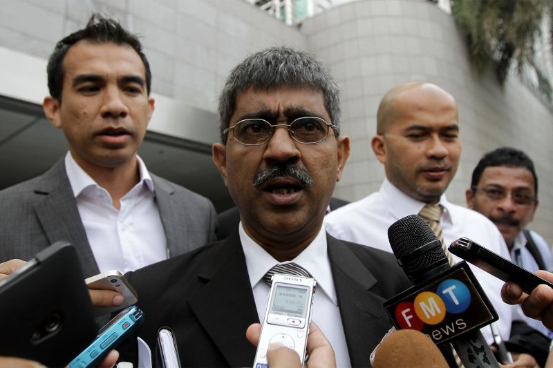 Lawyer, Mohamed Haniff Khatri Abdulla speaks to members of the media outside the Al-Bukhary Foundation building in Kuala Lumpur, November 6, 2015. u00e2u20acu2022 Picture by Yusof Mat Isa
