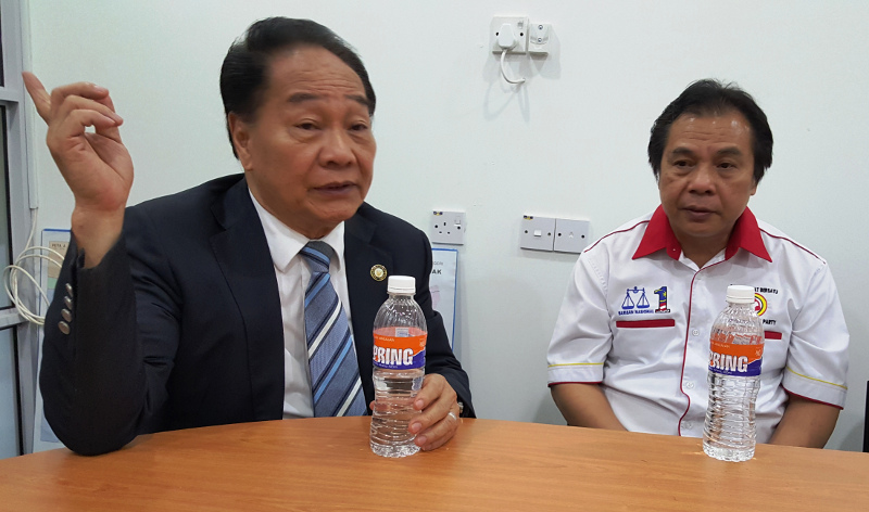 UPP president Datuk Seri Wong Soon Koh (left) with Datuk Dr Jerip Susil at a press conference on Nov 30, 2015, in Kuching. u00e2u20acu201d Picture by Sulok Tawie
