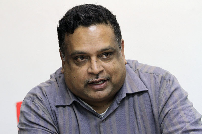 Charles Suresh Morais, the brother of the late Anthony Kevin Morais, speaking during a press conference at Americk Sidhu's office in Kuala Lumpur, Nov 25, 2015. u00e2u20acu201d Picture by Yusof Mat Isa