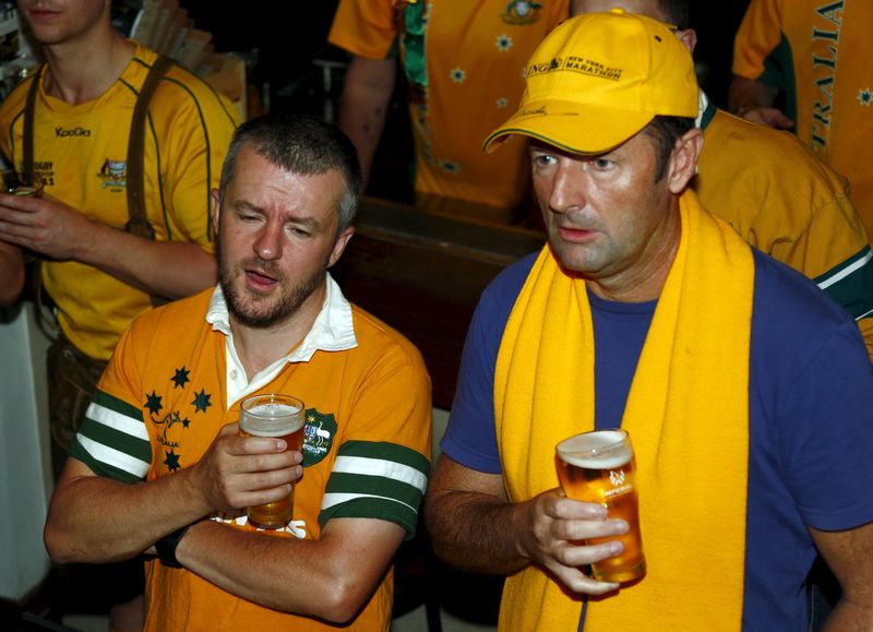 Fans of Australia's Wallabies rugby team react as they watch a live telecast of their team's loss to New Zealand's All Blacks during the Rugby World Cup final at a pub in Sydney, November 1, 2015. u00e2u20acu201d Reuters pic 