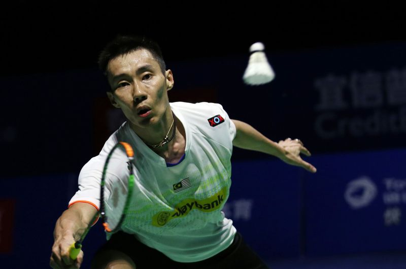 Lee Chong Wei of Malaysia hits a return against Chen Long of China during their menu00e2u20acu2122s singles final match at the China Open badminton tournament in Fuzhou, east Chinau00e2u20acu2122s Fujian province, on November 15, 2015. CHINA OUT AFP PHOTO