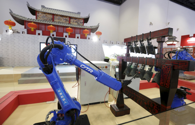 Two CTR robots play Chinese ancient chime bells at the World Robot Exhibition during the World Robot Conference in Beijing, China, November 24, 2015. u00e2u20acu201d Reuters pic