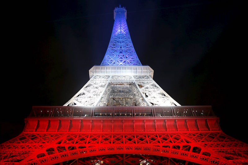 The Eiffel Tower is lit with the blue, white and red colours of the French flag in Paris November 22, 2015. u00e2u20acu201d Reuters pic