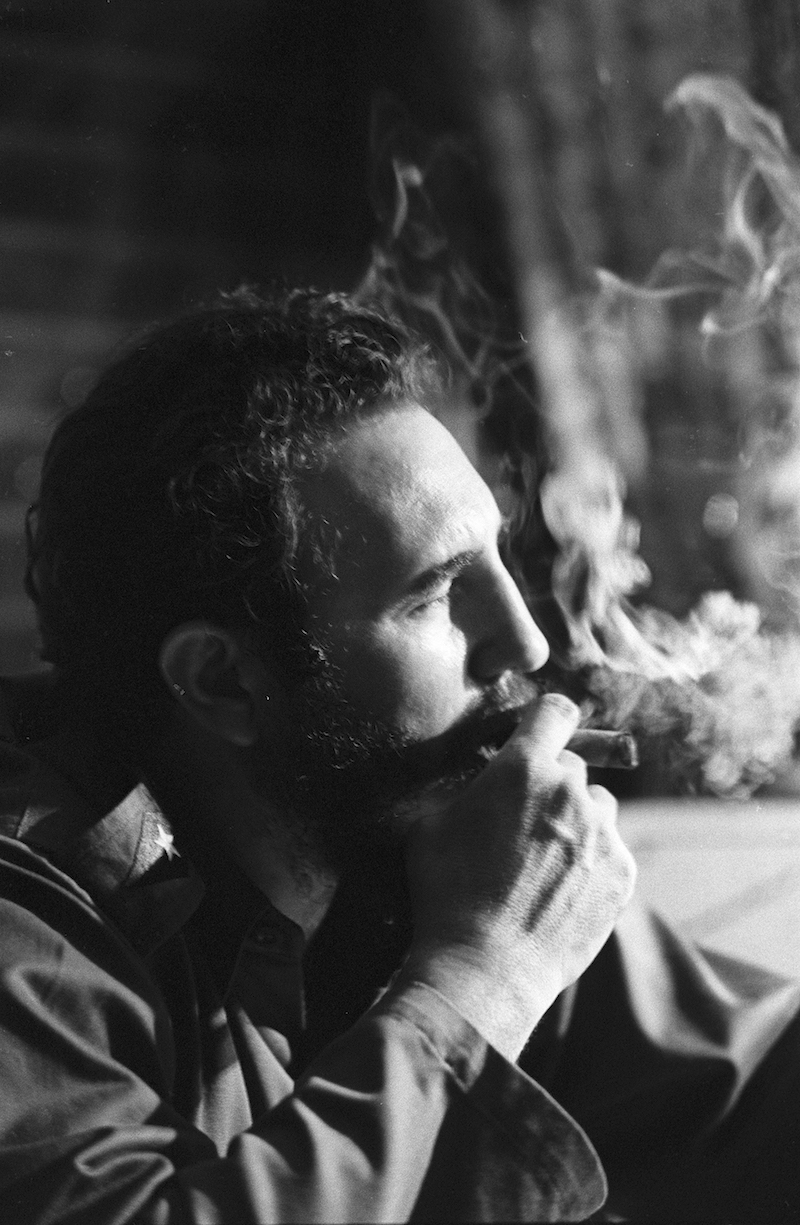 Former Cuban President Fidel Castro, trademark cigar in hand, during an interview at one of his apartments in Havana, 1964. — Picture by Jack Manning/ The New York Times