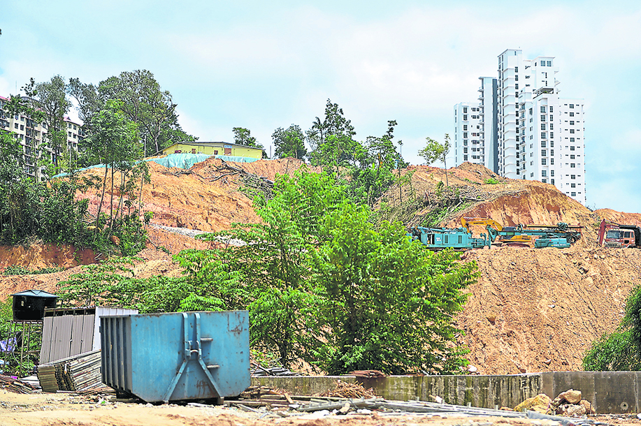 Penang Chief Minister Lim Guan Eng promised that the stripped bare Bukit Gambir would regain its greenery through replanting. u00e2u20acu201d File pic