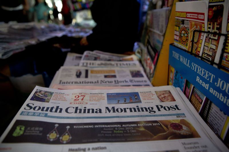 Copies of the South China Morning Post November 28, 2015, on sale at a newsstand in Hong Kong. Chinese Internet tycoon Jack Mau00e2u20acu2122s mooted buyout could see the paper prosper from his Midas touch, but also further erode its independence. AFP PHOTO / DALE DE