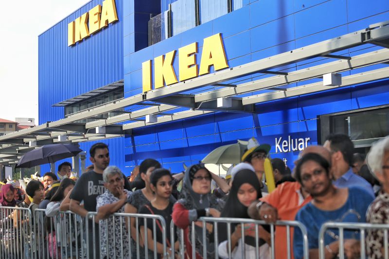 Excited customers start lining up in front of Ikea Cheras since 7am to catch its opening and Housewarming Party. ― Picture by Saw Siow Feng
