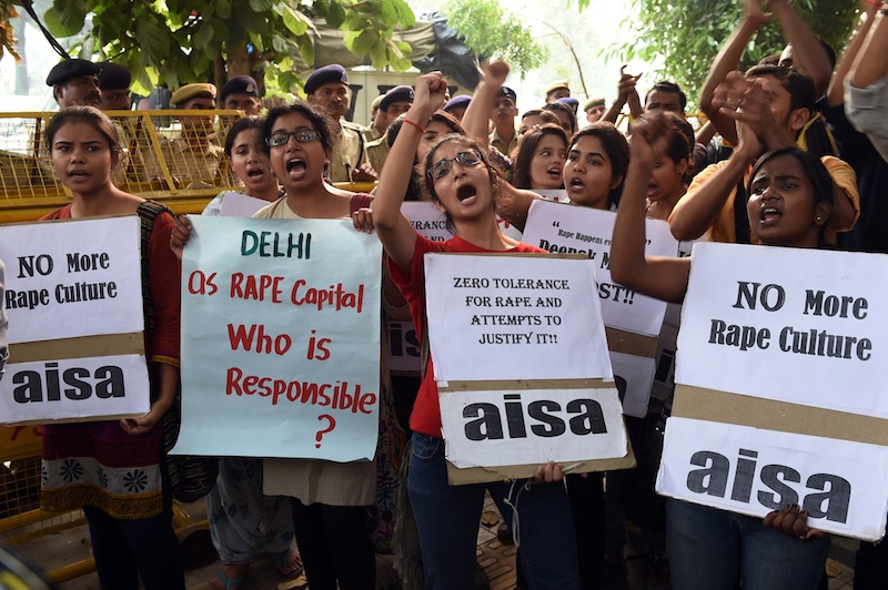 Indian students shout slogans during a protest against the rapes of two minor girls outside the police headquarters in New Delhi on October 18, 2015. u00e2u20acu201d AFP pic