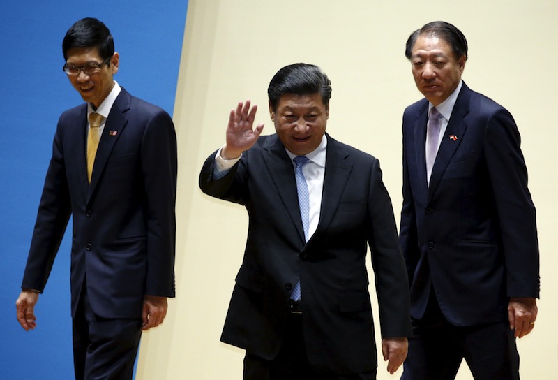 Chinese President Xi Jinping leaves after speaking at the 'Forging A Strong Partnership to Enhance Prosperity of Asia' Lecture at the National University of Singapore November 7, 2015. u00e2u20acu201d Reuters pic