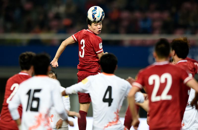 Mei Fang of China (centre) heads the ball during a World Cup qualifying match against Bhutan in Changsha, China's Hunan province on November 12, 2015. u00e2u20acu201d AFP pic