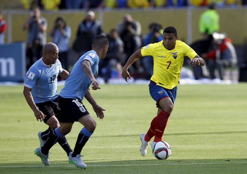 Ecuador's Jefferson Montero (right) controls the ball under pressure from Uruguay players during their World Cup qualifying match in Quito, November 12, 2015. u00e2u20acu201d Reuters pic