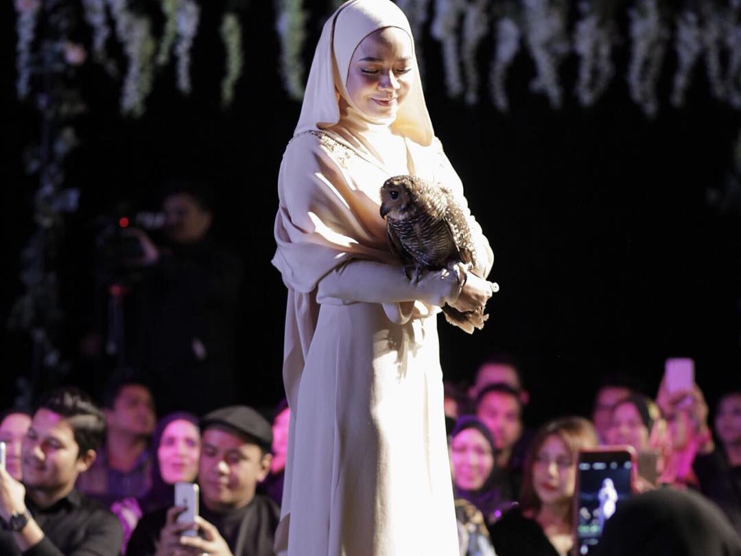 Local actress Nora Danish got hit with accusations that she was showing an Illuminati symbol for appearing with an owl on the catwalk. u00e2u20acu2022 Picture courtesy of Instagram/Nora Danish