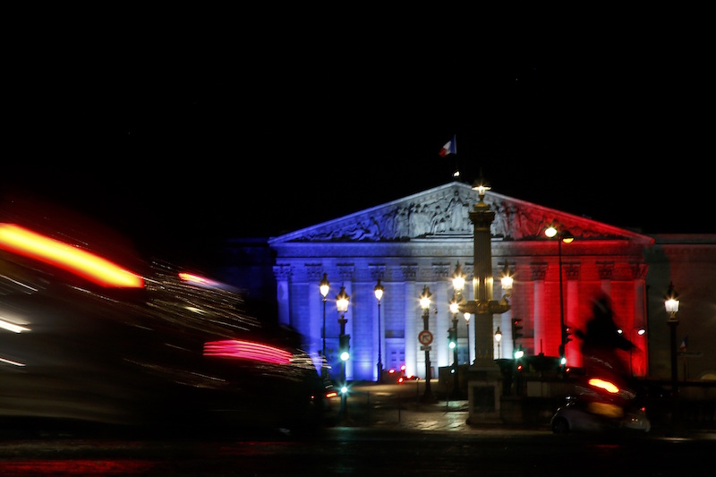 Evening traffic makes its way across the Place de la Concorde towards the National Assembly that is lit in the blue, white and red colours of the French flag in central Paris November 25, 2015. u00e2u20acu201d Reuters pic
