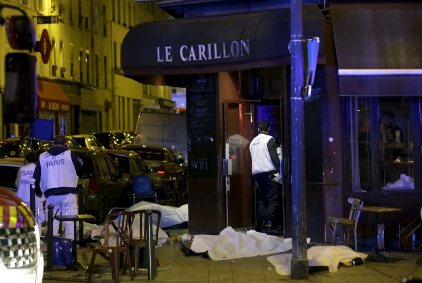 A general view of the scene that shows the covered bodies outside a restaurant following a shooting incident in Paris, France, November 14, 2015. u00e2u20acu201d Reuters pic