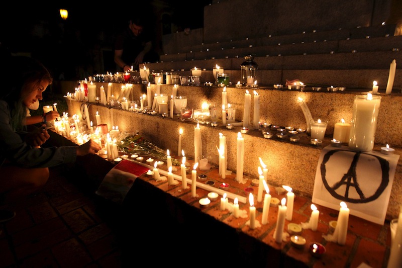 People light candles in tribute to the victims of Friday's Paris attacks, in Santo Domingo November 15, 2015.u00c2u00a0u00e2u20acu201d Reuters pic