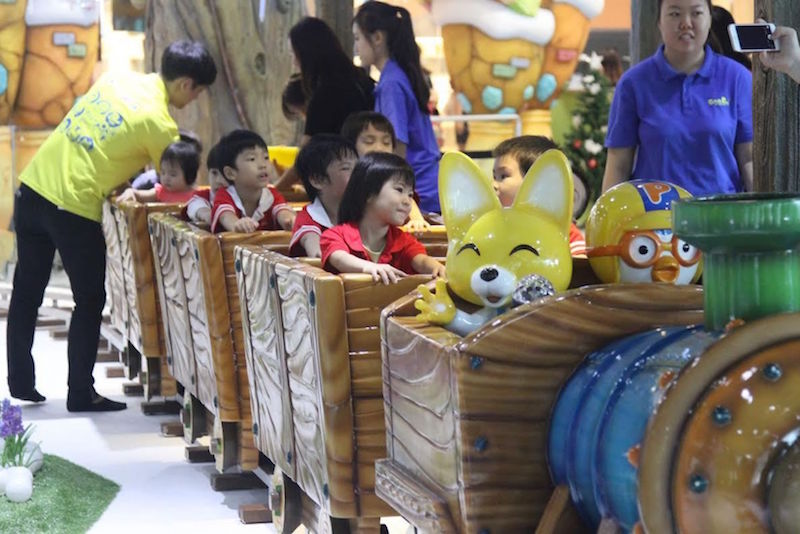 Children aboard the miniature train, one of the attractions in Pororo Park. — TODAY pic