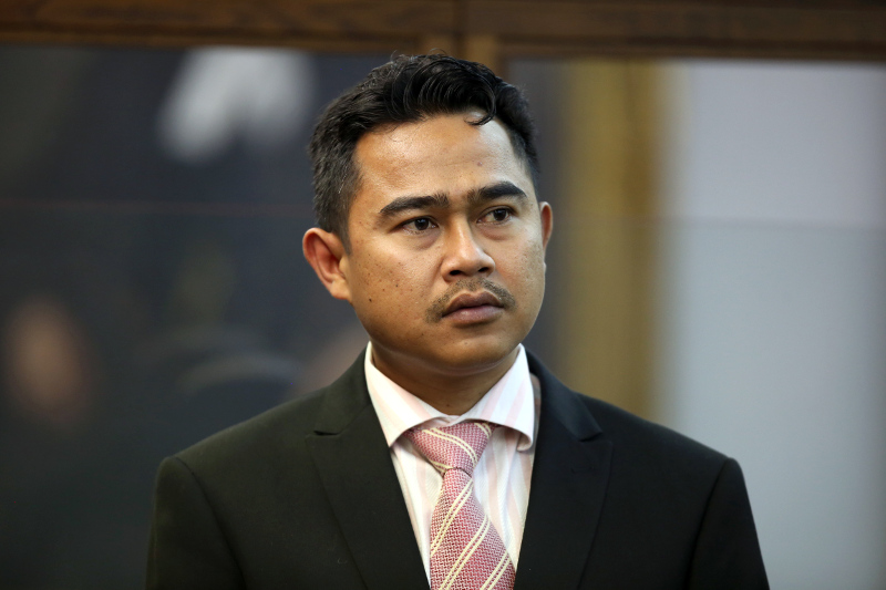 Former military attache Mohammed Rizalman bin Ismail stands in the dock as he pleads guilty in Wellington on November 30, 2015, to the indecent assault of a New Zealand woman, with a court hearing he burst into her bedroom naked from the waist down. u00e2u20acu201d A