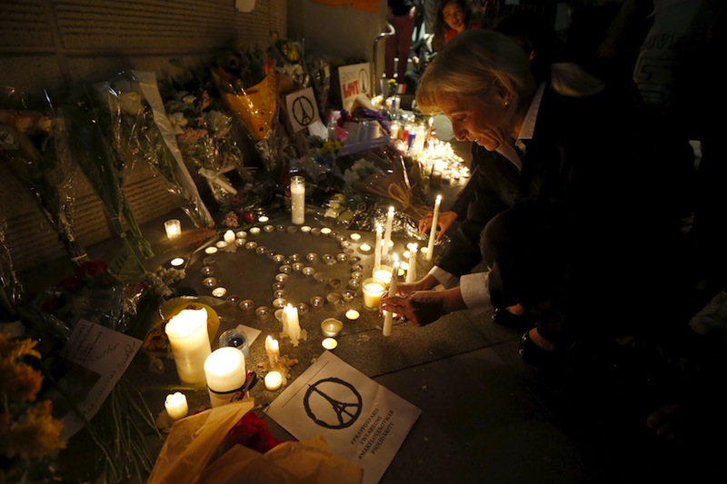 People gather for a vigil outside the French Consulate in response to the attacks in Paris, in Los Angeles, California, United States, November 14, 2015. u00e2u20acu201d Reuters pic