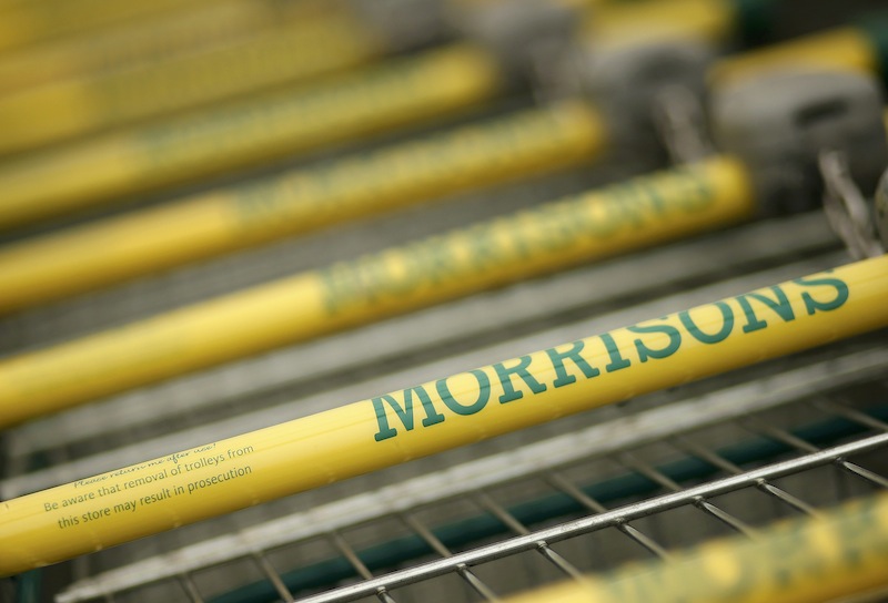 Shopping trolleys stand outside a Morrisons supermarket in Liverpool, Britain, in this file photograph dated March 12, 2015. u00e2u20acu201d Reuters pic