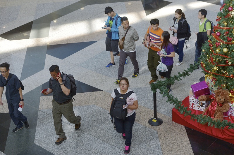 Family members of victims of the deadly bus crash in Chiang Mai are seen at the Kuala Lumpur International Airport (KLIA) in Sepang before departing to Thailand, December 21, 2015. u00e2u20acu201d Bernama pic