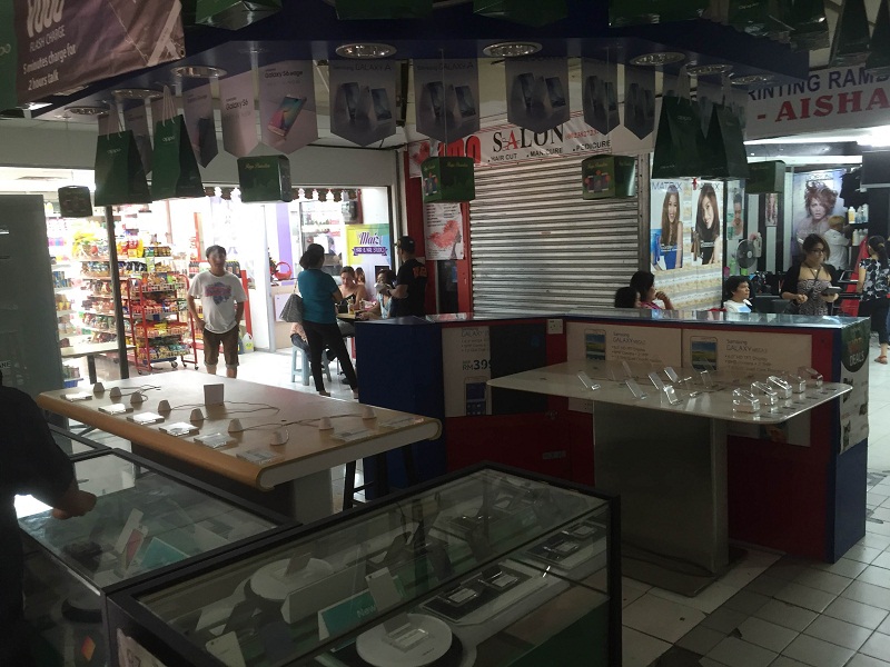 Some of the handphone shops at Kota Raya Complex were closed today after a brawl took place here yesterday. u00e2u20acu201d Picture by Kamles Kumar