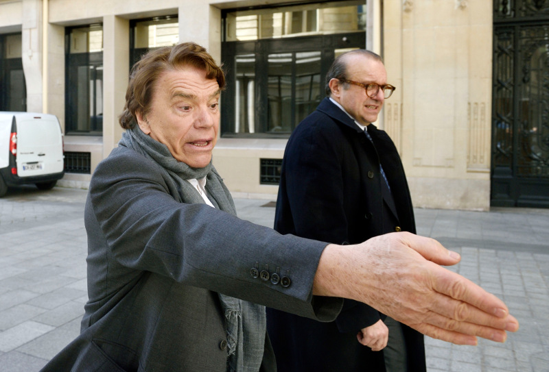 French businessman Bernard Tapie (left) flanked by his lawyer Herve Temime. The Paris appeals court on Dec 3, 2015 rejected Tapieu00e2u20acu2122s claim that the now-defunct Credit Lyonnais bank had defrauded him on the sale of the sportswear giant Adidas in the early