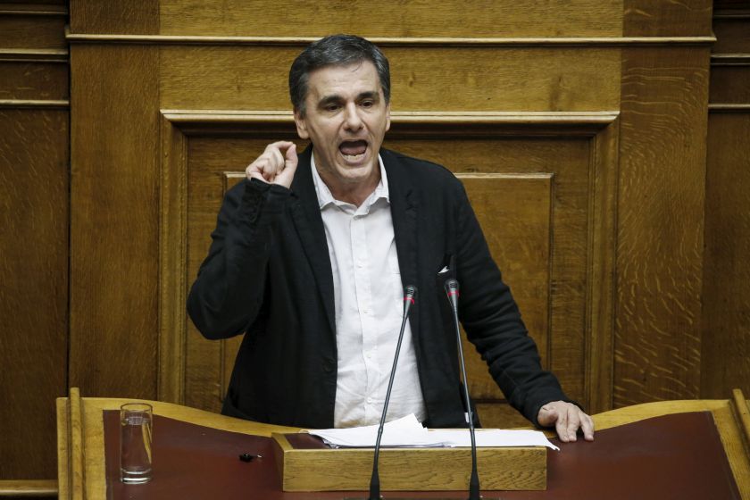 Greek Finance Minister Euclid Tsakalotos addresses lawmakers during a parliamentary session before a budget vote in Athens, Greece, December 6, 2015. u00e2u20acu2022 Reuters picnn
