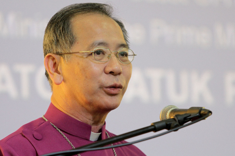 Archbishop Datuk Ng Moon Hing speaking at the Christian Federation of Malaysia high tea in Kuala Lumpur, Dec 25, 2015. u00e2u20acu201d Picture by Yusof Mat Isa