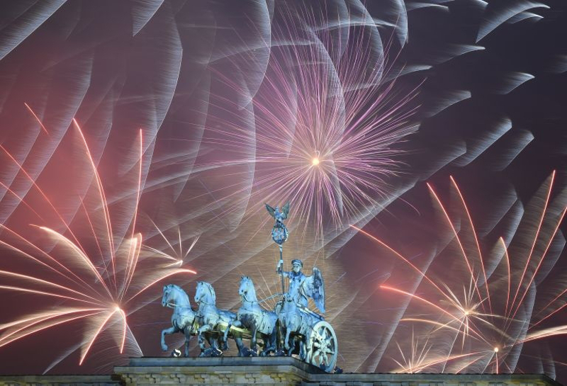 The New Year celebrations at Brandenburg Gate in Berlin attract a large crowd of revellers. u00e2u20acu201d AFP pic