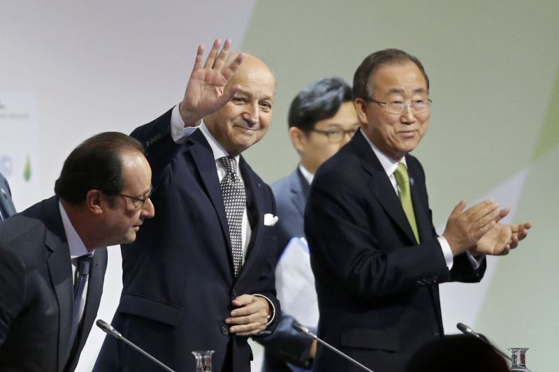 President Francois Hollande (L) Foreign Affairs Minister Laurent Fabius (C), president-designate of COP21, UN Secretary-General Ban Ki-moon, World Climate Change Conference 2015 (COP21), Le Bourget, near Paris, December 12, 2015. REUTERS/Stephane Mahe 