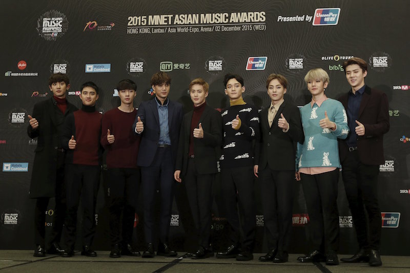 Members of EXO pose on the backstage after winning Album of the Year award in 2015 Mnet Asian Music Awards (MAMA) in Hong Kong December 3, 2015. — Reuters pic