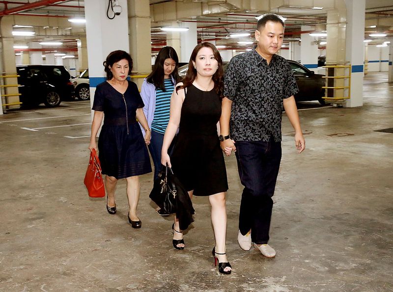 Family members of the murder victims arriving at the Supreme Court for the sentencing of murder suspect Iskandar Rahmat December 4, 2015. u00e2u20acu201d TODAY pic 