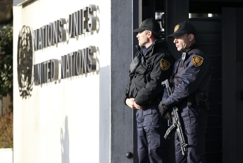 United Nations security officers outside UN European headquarters in Geneva, December 10, 2015, after Swiss federal police said authorities had informed Geneva police about people with possible u00e2u20acu02dclinks to terrorismu00e2u20acu2122. REUTERS/Pierre Albouy