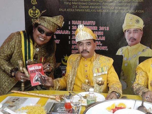 Noor Jan Tuah (right) has been remanded by the Malacca Magistrate's Court to help in the investigation into a case involving himself claiming to be the Sultan of Malacca on January 15 last year. u00e2u20acu2022 File picn