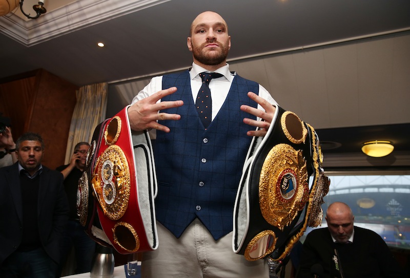 Tyson Fury poses with his belts  at The Whites Hotel, Macron Stadium, Bolton.u00c2u00a0u00e2u20acu201d Reuters pic