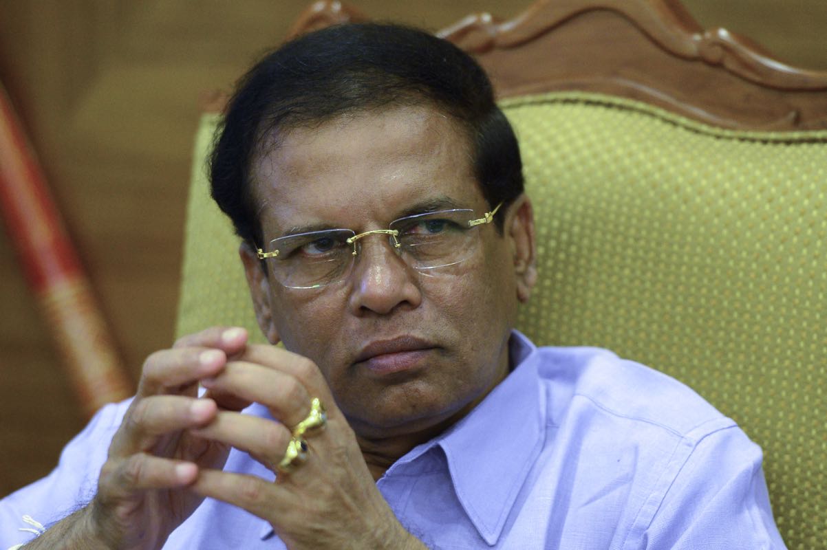 Sri Lankan President Maithripala Sirisena listens to an AFP journalist during an interview in Colombo on January 3, 2016. u00e2u20acu201d AFP pic
