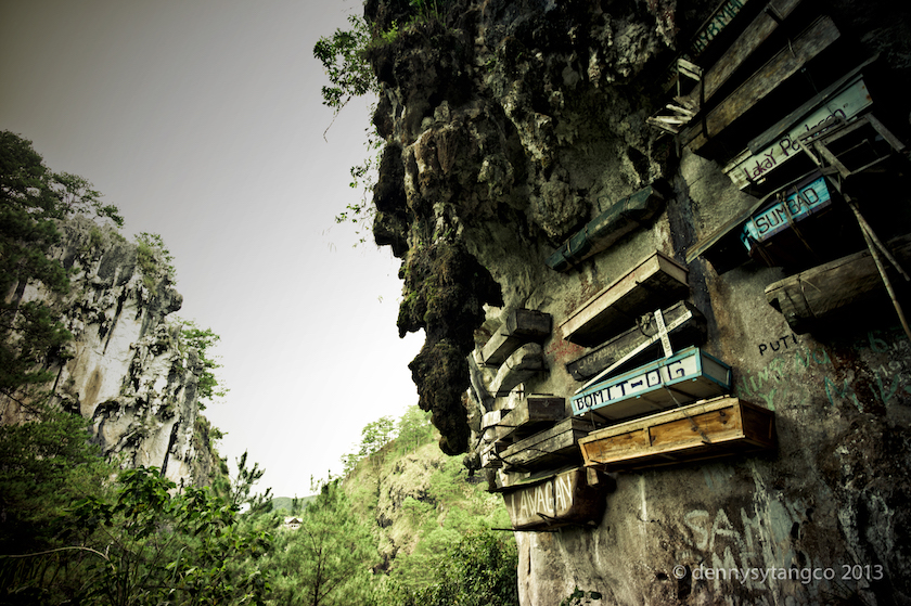 The cliff-hanging coffins supposedly kept their occupants closer to heaven. Picture by Denny Sytangco/Flickr via TheLineUp/Reuters
