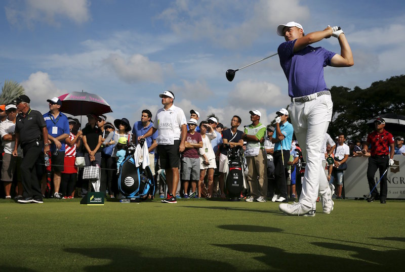 Jordan Spieth of the US tees off on the 18th green during the rain delayed second round of the SMBC Singapore Open golf tournament at Sentosau00e2u20acu2122s Serapong golf course in Singapore January 30, 2016. u00e2u20acu201d Reuters pic