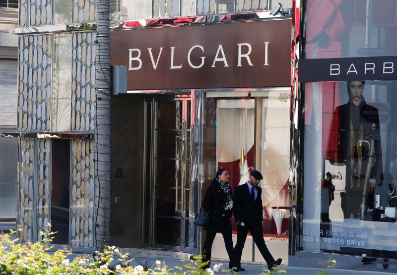 File picture shows tourists walking past the Bulgari boutique on Rodeo Drive, decorated for Christmas, in Beverly Hills December 9, 2013. u00e2u20acu201d Reuters pic