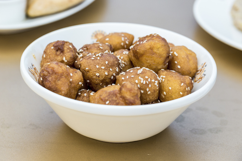 A bowl of luqaimat, a puffy and sweet fried dumpling, a brunch staple at Zaman Awal, a restaurant in the Al Boom tourist village in Dubai, United Arab Emirates, December 11, 2015. — Picture by Christophe Viseux/The New York Times