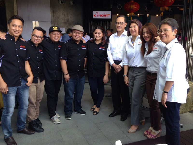 Sabah Tourism, culture and environment minister Datuk Masidi Manjun (fourth right) with Fui (third right) and the crew of KupiKupiFm at the radio stationu00e2u20acu2122s launching Jan 28, 2016. u00e2u20acu201d Picture by Julia Chan