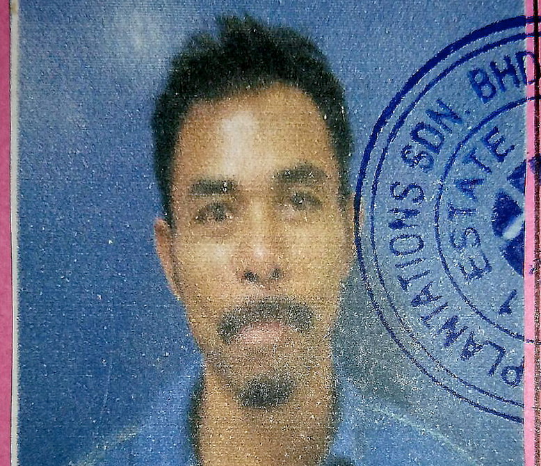 Police release a picture of a suspect known as Rakku Bakri, 40, who is being sought for investigation in the stabbing to death of his ex-wife and stepson in Cap Estate 1, Kinabatangan. u00e2u20acu201d Bernama pic
