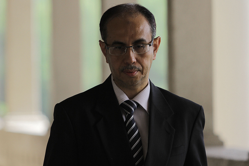 Institut Profesional Baitulmal CEO, Syed Omar Syed Agil arriving at the High Court in Kuala Lumpur, Jan 4, 2016. u00e2u20acu201d Picture by Yusof Mat Isa
